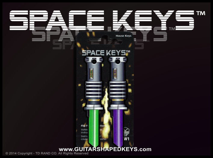 2 Green and Purple Light Saber Shaped Space Keys