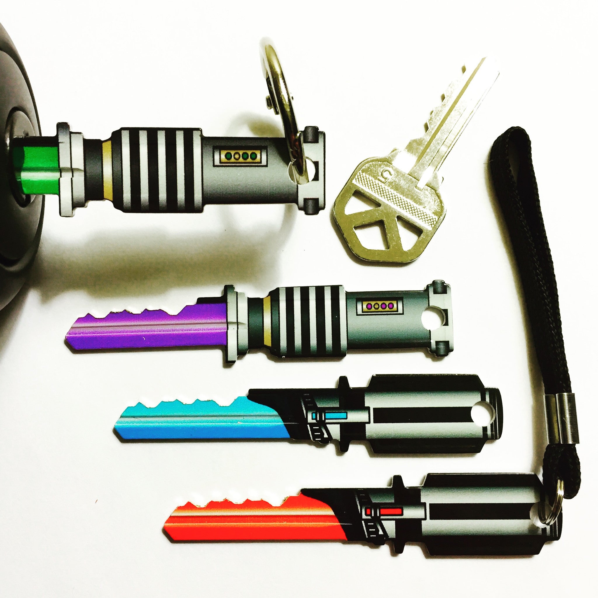 Full Set (4) Red, Purple, Green, and Blue Light Saber Shaped Space Keys!