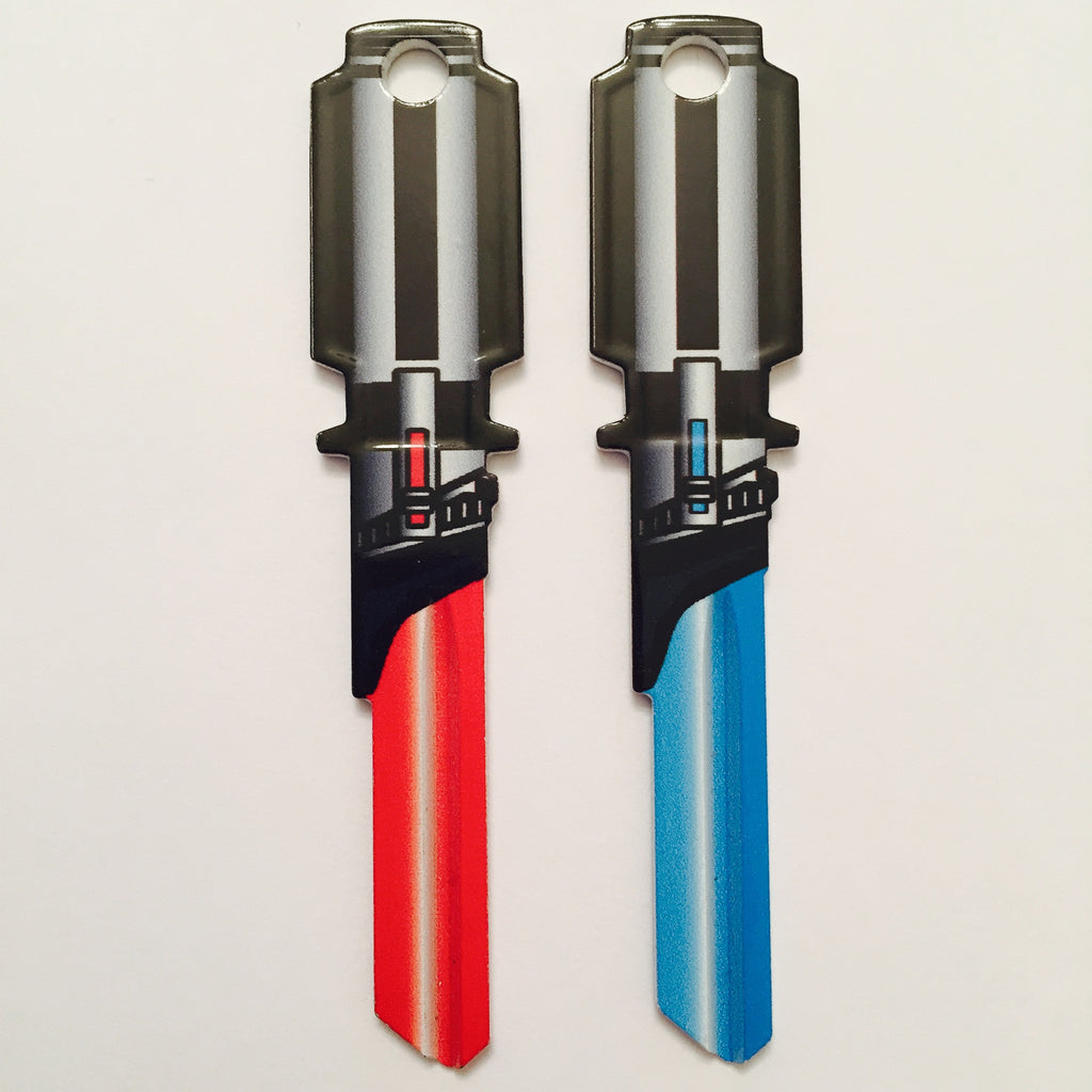 2 Red and Light Blue Light Saber Shaped Space Keys